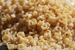 Pasta in the form of numbers and letters of the Latin alphabet photo