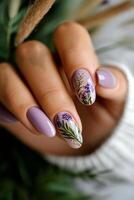 Lavender Floral Nail Art Design Showcased on Hand Against Soft Background in Cozy Indoor Setting photo