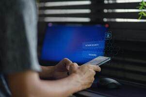 Person Using Smartphone to Access Network Security Technology Concept photo