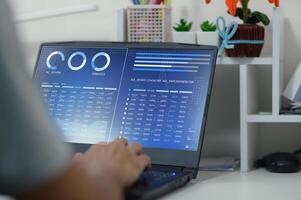 Modern Laptop Displaying Data Visualizations and Business Elements photo