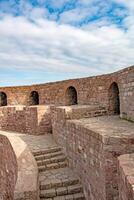 Ancient Stone Fortress Walls Architectural Detail and Pathway photo