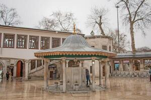 Stunning Ottoman Architecture Courtyard Fountain in Istanbul photo