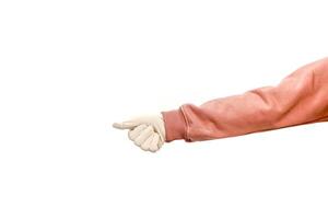 Isolated arm pointing with gloved hand, demonstrating direction or suggesting a choice on a blank background photo