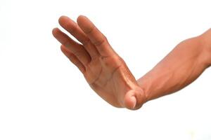 Hand gesturing stop on isolated white background, showcasing hand signals and expressions of human communication photo