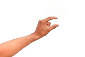 Conceptual image of a hand gesturing to indicate small size against a white background photo