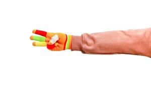 A colorful hand showing the number three on a white background conveys a playful vibe photo