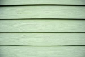 Close-up of Pale Green Wood Siding with Horizontal Lines and Subtle Wood Grain Texture, Suitable for Backgrounds photo