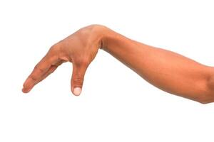 An Arm and Hand Isolated on White Background in a Pointing Downward Gesture photo