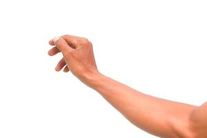 Isolated arm and hand of a person reaching for something against white background in studio shot photo
