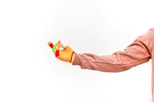 Isolated Hand Wearing a Colorful Finger Splint Pointing Upwards on White Background photo