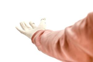 Open hand wearing glove, isolated on white, reaching out for assistance or offering help, clean and minimalistic presentation photo