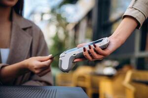 Customer using card for payment photo