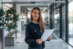 Woman is indoors, professional manager of the place photo