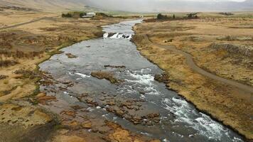 Aerial view of the scenery in Iceland with a waterfall video