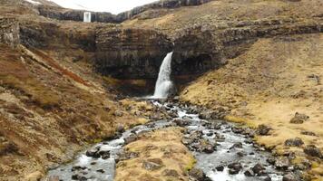 Aerial view of the scenery in Iceland with a waterfall video