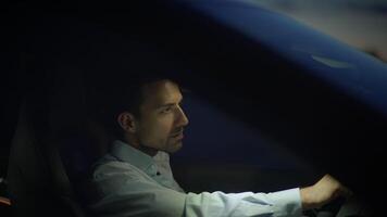 Candid Night Drive Reflection A Thoughtful and Pensive Driver During a Nighttime Journey video