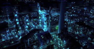 The industrial complex is illuminated at night, showcasing its modern infrastructure and machinery video