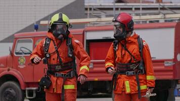 A team of firefighters comes together to celebrate and share their joy and relief after a successful operation, demonstrating the strong bond and camaraderie among these heroic individuals video