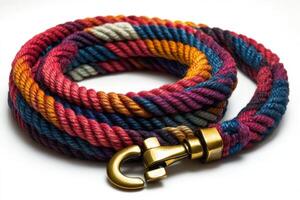 A colorful rope with a brass golden hook on it photo