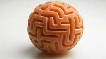 A close up of an orange ball with a maze pattern photo