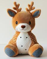 A stuffed deer with a blue polka dot pattern photo