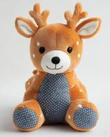 A stuffed deer with a polka dot pattern on its back photo