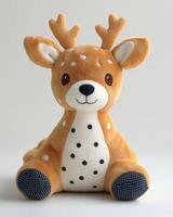 A stuffed deer with spots on its back photo