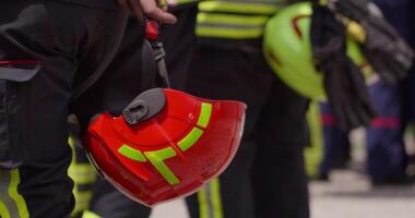 A team of firefighters comes together to celebrate and share their joy and relief after a successful operation, demonstrating the strong bond and camaraderie among these heroic individuals video