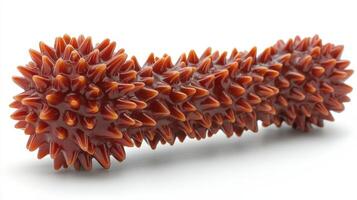 A toy that has been made out of red and brown spikes photo