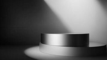 Silver cylindrical pedestal Elevated smooth and metallic Spotlight accentuates form and surface Ideal for display Sleek modern and eye-catching photo