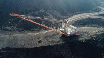 An Aerial View of Heavy Machinery Engaged in Coal Mining Operations and Activities. Stock Clip video
