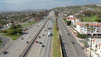 Aerial views capture the vibrant coastline and busy highways of San Clemente, California video