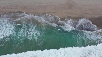 Aerial drone view of the San Clemente coastline showcasing ocean waves and sandy beaches video
