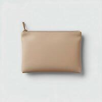 Compact Blank Beige Zipper Pouch Mockup for Cosmetic or Travel Branding With Textile Texture and Realistic Lighting photo