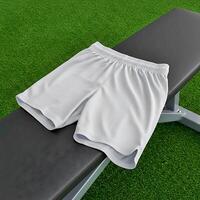 White Sport Shorts Mockup on Gym Bench with Green Turf Background photo