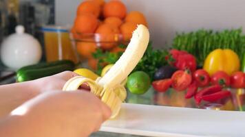 Sliced ripe yellow banana, slices of ripe banana on the kitchen table video