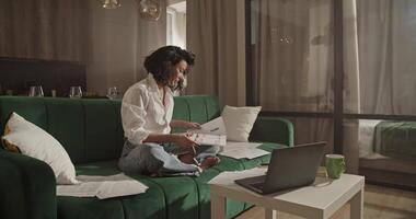 Female architect making phone call to client video