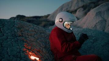 Lone Astronaut Prepares For The Night In A Mountain Of A Hostile Planet video