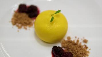 lemon shaped cake closeup shot of a plate with a lemon shape cake and a fork video