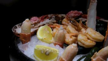 Serving crab in a restaurant. Fresh crab dish. Beautiful serving of a whole crab on ice. Big ready crab on ice. video