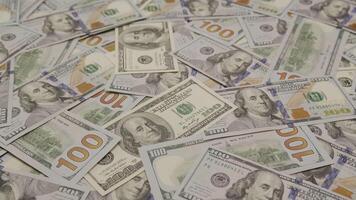 100 Dollar Bills on Table in Random Order video