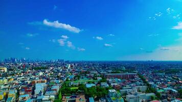 A timelapse of panoramic view at the urban city in Nerima Tokyo daytime wide shot panning video