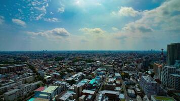 A timelapse of panoramic view at the urban city in Nerima Tokyo daytime wide shot zoom video