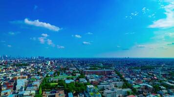 A timelapse of panoramic view at the urban city in Nerima Tokyo daytime wide shot panning video