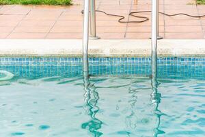 Summer Holiday Scene By the Edge of the Swimming Pool. photo