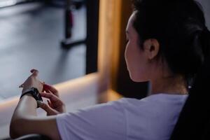 Checking progress with modern smart watch after physical activit photo