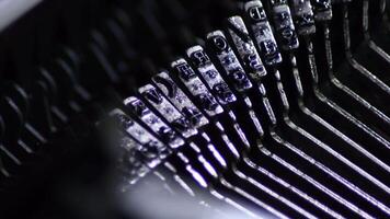 Old typo keys of a manual qwerty typewriter writing video