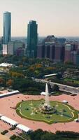 Aerial view of Chicago skyline and Grant Park. Aerial view of downtown Chicago skyline and Grant Park with the iconic Buckingham Fountain in the foreground on a video