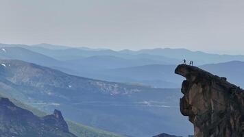 Hikers Enjoying Breathtaking Views From Mountain Top video