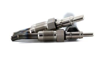 Group of new glow plugs for a diesel engine, isolated on a white background. photo